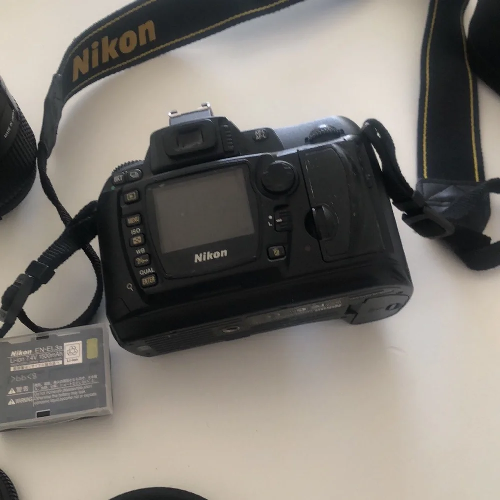 Nikon D70 Camera with 2 batteries, case & all you see!
